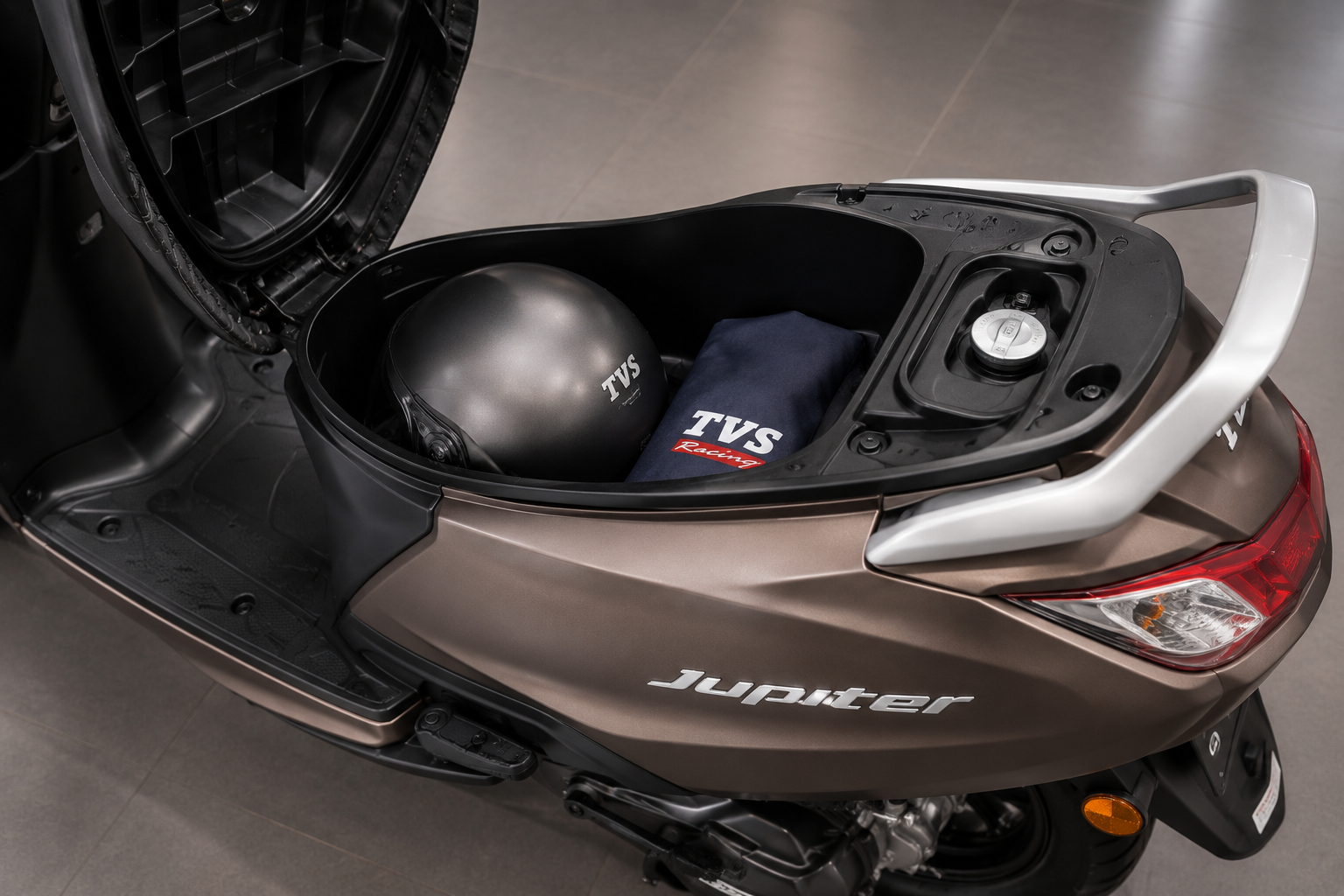 TVS Jupiter underseat storage with helmet kept inside