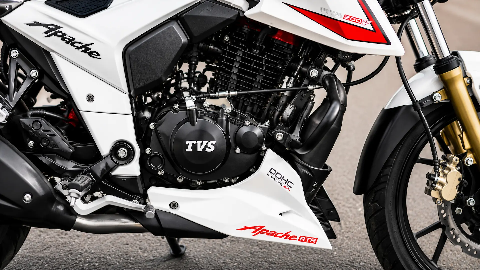White TVS Apache RTR 200 4V front projector headlamp view