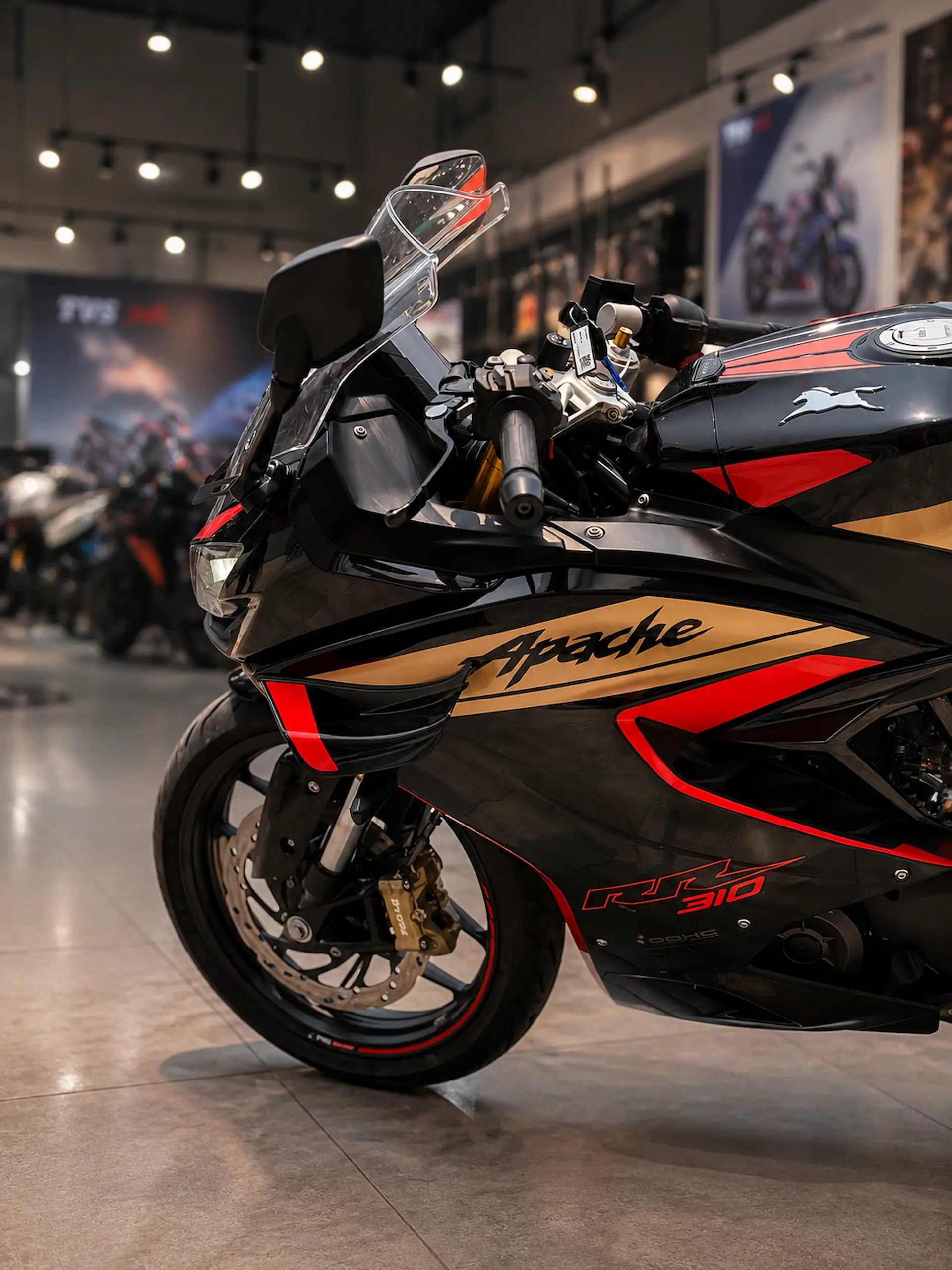 TVS Apache RR 310 front three-quarter view with Bi-LED twin projector headlamps