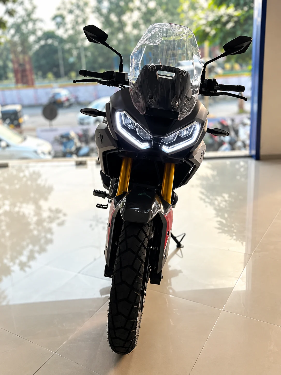 TVS Apache RTX 300 rear view showing tail light and pillion grab rail