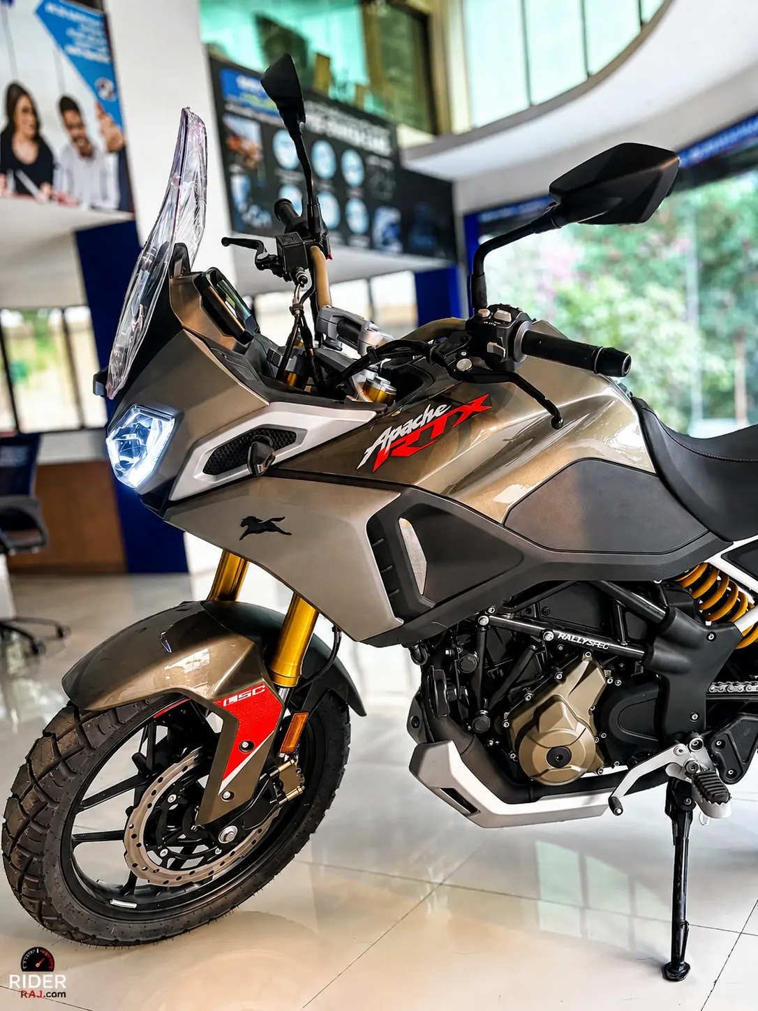 TVS Apache RTX 300 riding on an open road showing colour and design