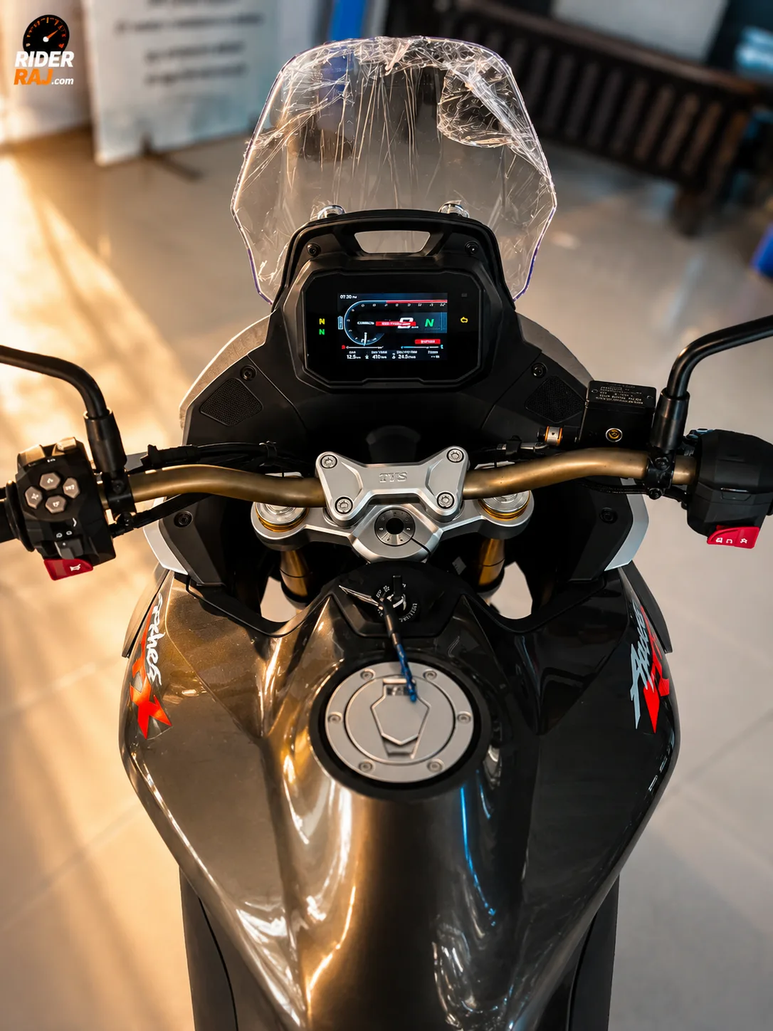 TVS Apache RTX 300 5-inch TFT instrument console displaying navigation